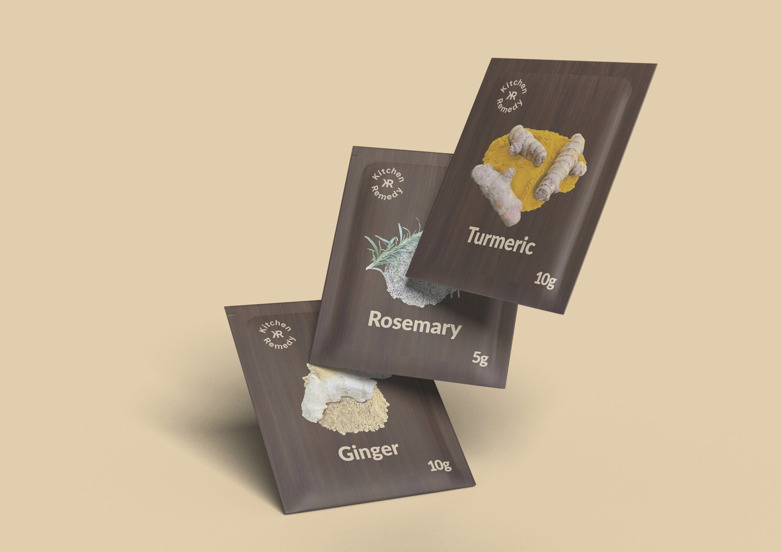 A mockup showing three of the packet designs - turmeric, rosemary and ginger