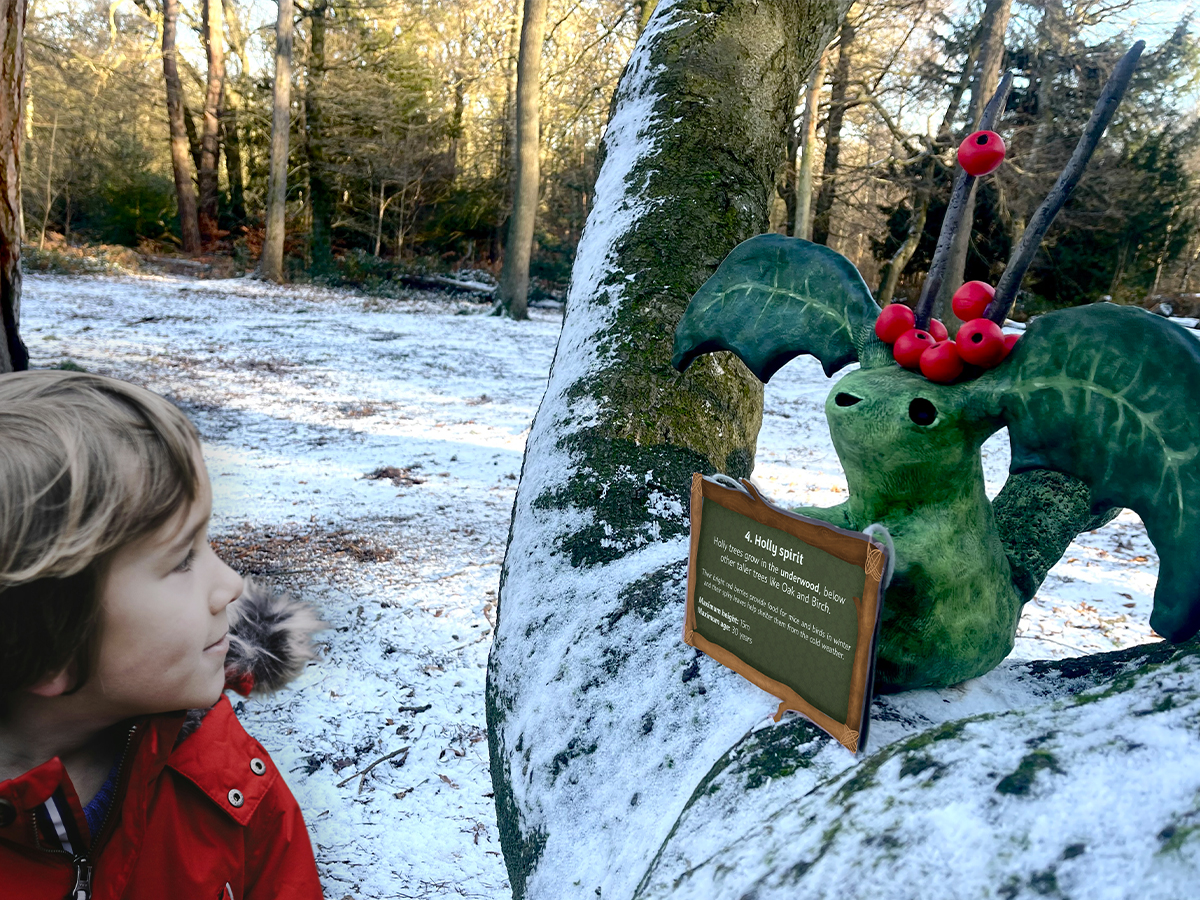 Child looking at the Holly tree spirit.