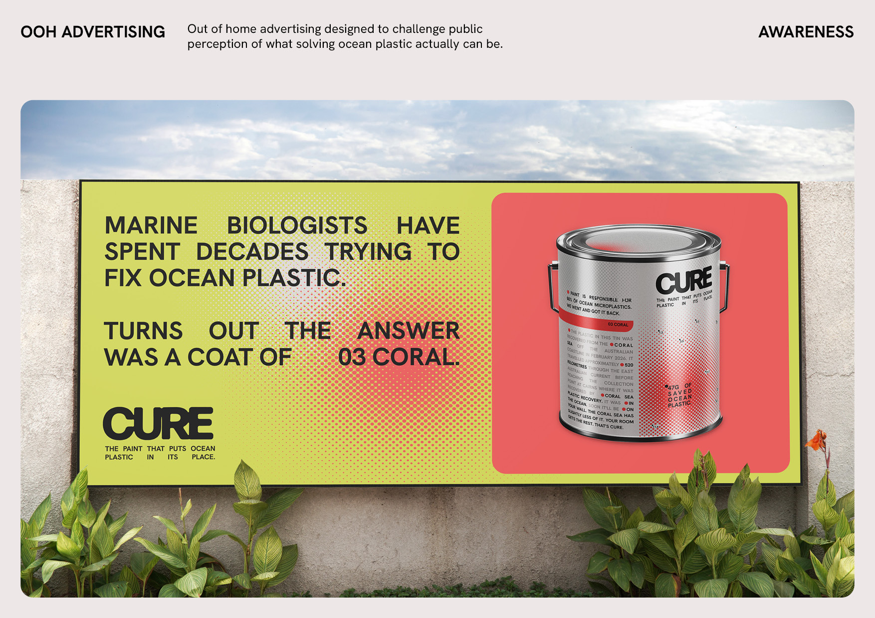 A CURE billboard mounted outdoors reading "Marine biologists have spent decades trying to fix ocean plastic. Turns out the answer was a coat of 03 Coral."