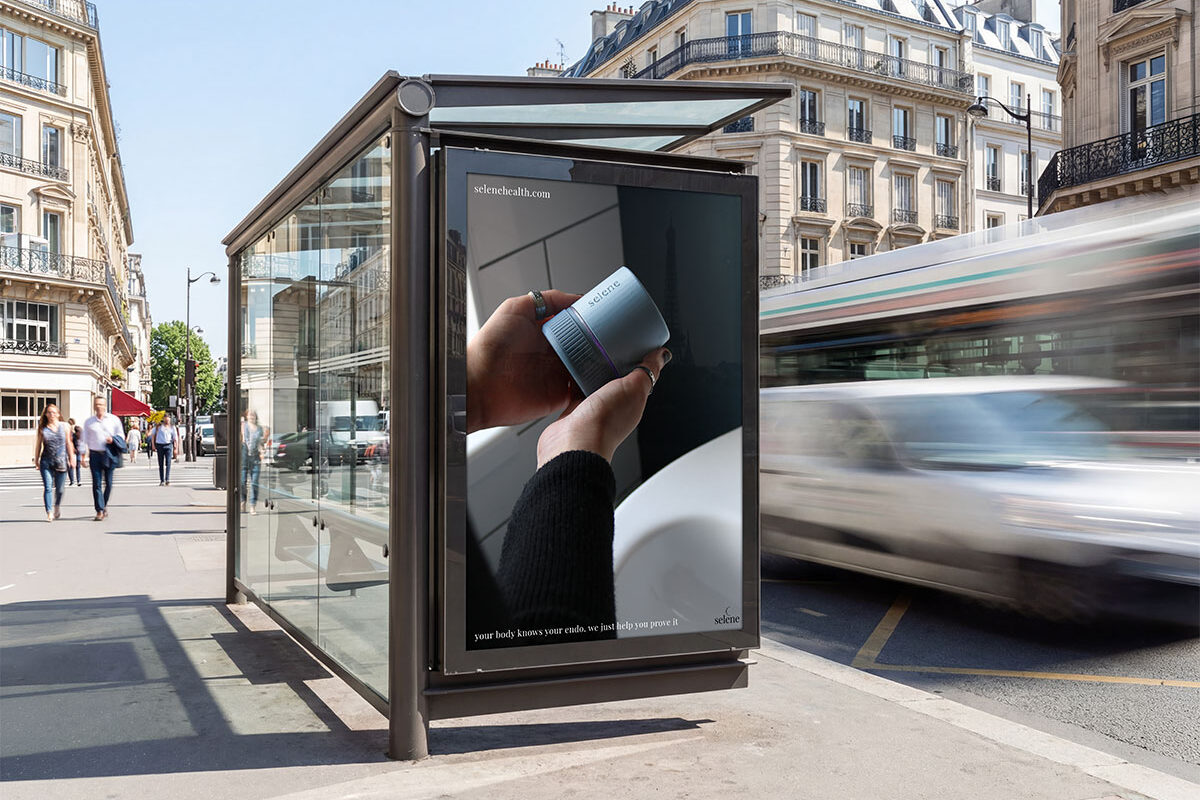 a bus advertisement of selene reading "your body knows your endo, we just help you prove it"
