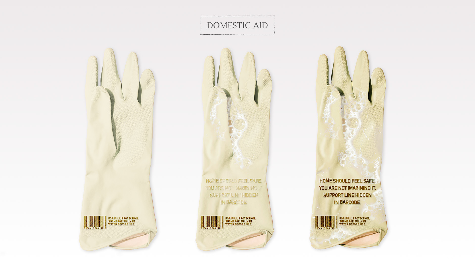 Three washing up gloves shown side by side demonstrating the message reveal sequence. The first glove shows no message, the second shows the text beginning to appear through soapy water, and the third shows the full message clearly visible.